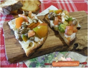bruschetta pomodoro bastoncino squacquerone di romagna