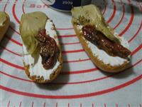 Crostini carciofini pomodori secchi immagine 2