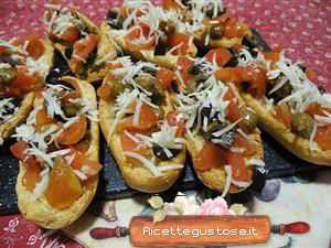 Crostini pomodorini e occelli al barolo
