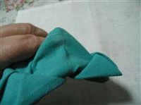 piegare tovagliolo fiore di loto immagine 16