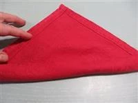 piegare tovagliolo a forma di rosa immagine 4