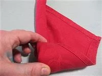 piegare tovagliolo a forma di rosa immagine 6
