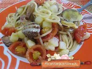 immagine spaghetti vongole e funghi