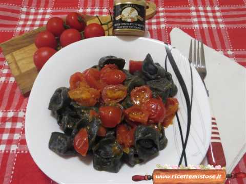 tortelli carbone pate coniglio al tartufo