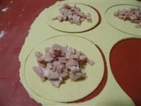 Mettere la mortadella a cubetti